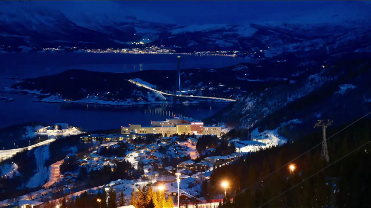 Snow-covered Nordic village at twilight